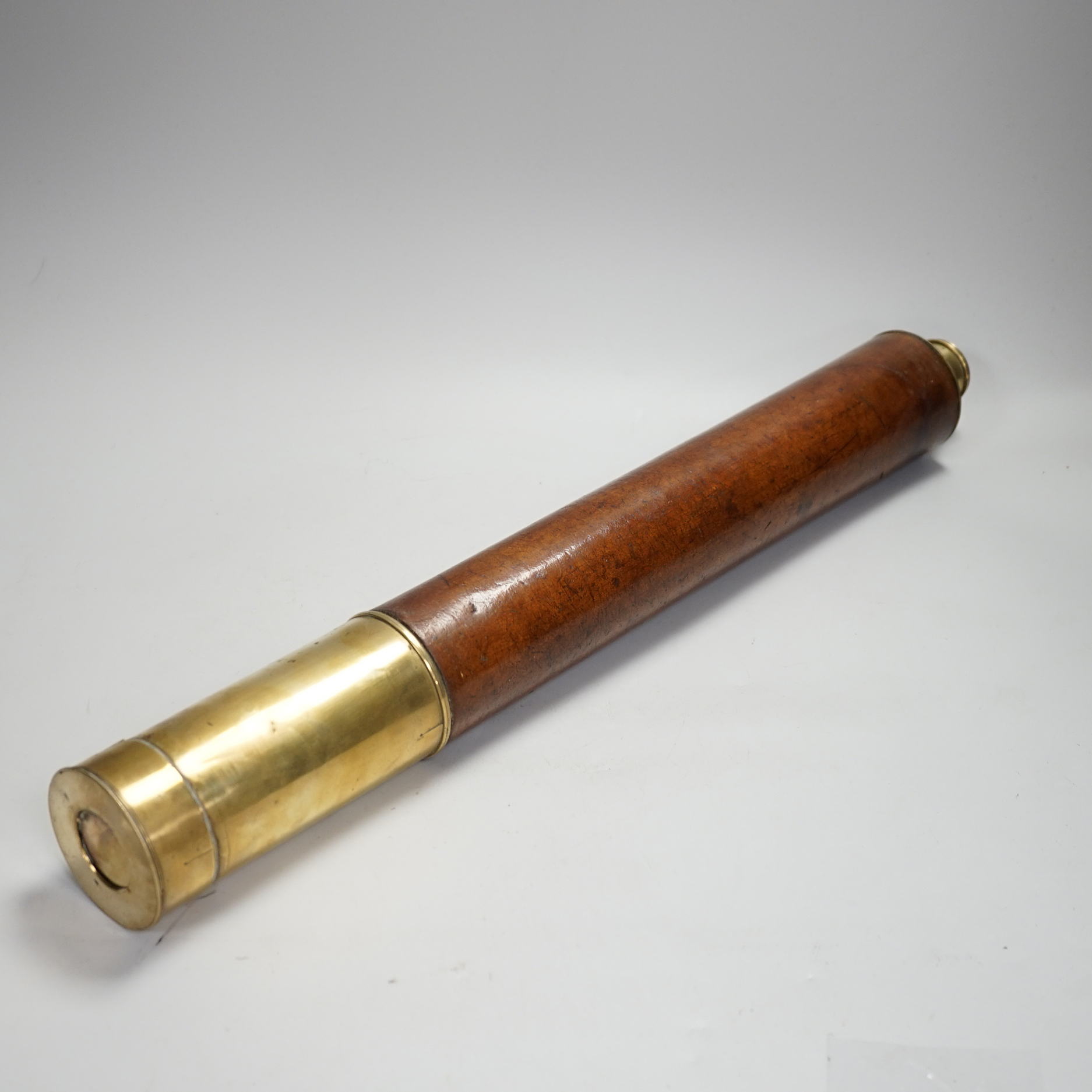 A Victorian two-draw brass telescope with leather cover to body by Mason of Dublin, 53cm when closed